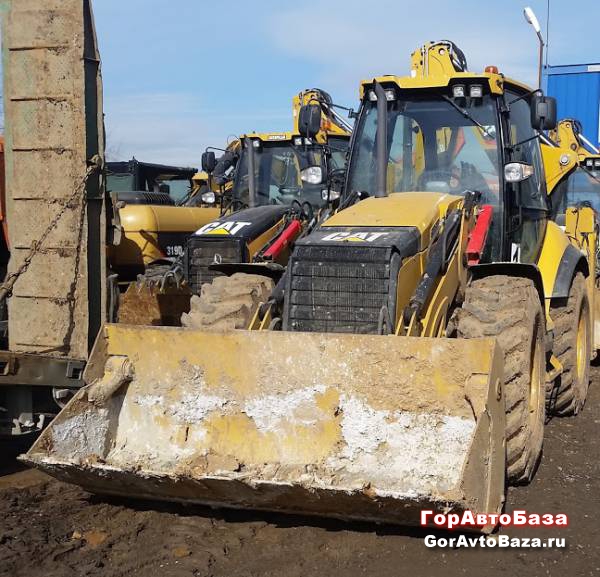 Экскаватор-погрузчик Caterpillar 